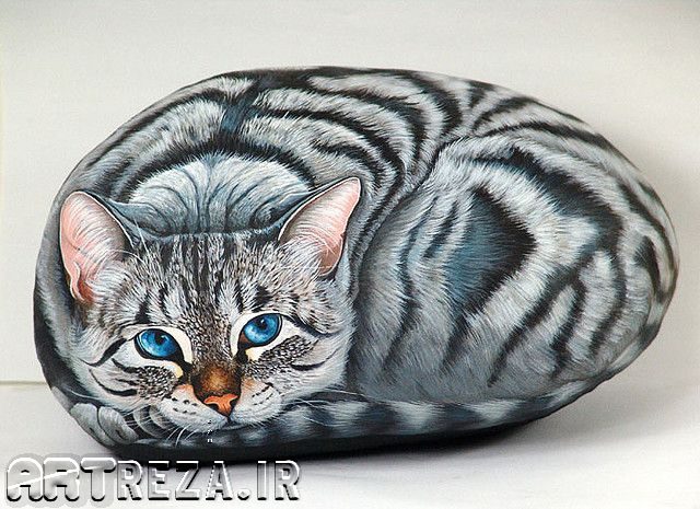 نقاشی گربه روی سنگ