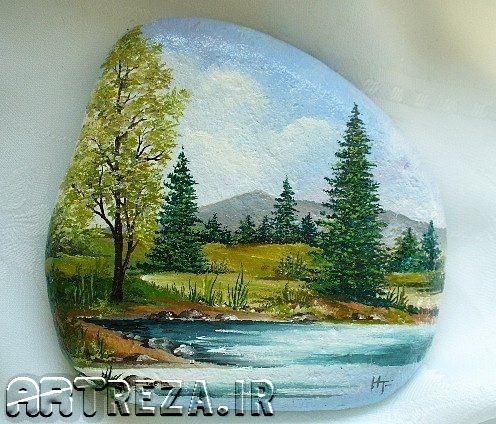 نقاشی جنگل و دریاچه روی سنگها